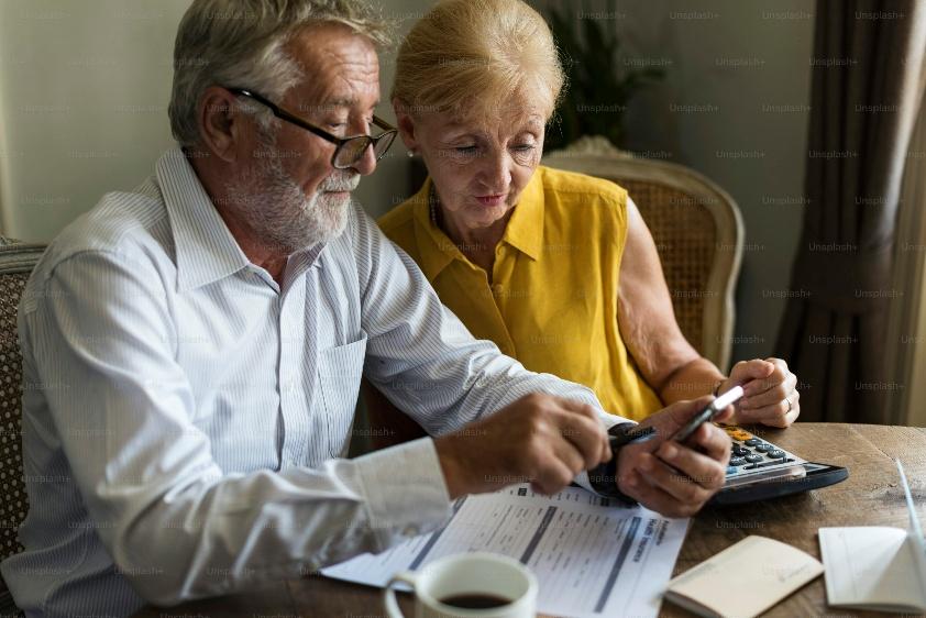An elderly couple reviewing Medicare supplement insurance in Fresno