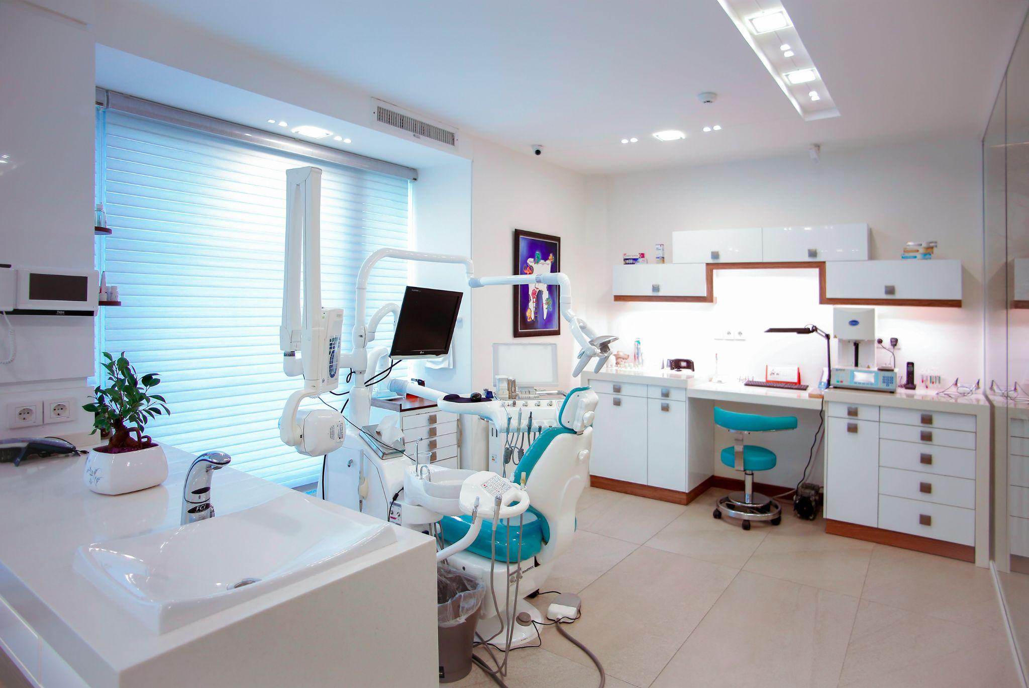 A bright dental treatment room with modern equipment illustrates services covered by dental insurance in Fresno.