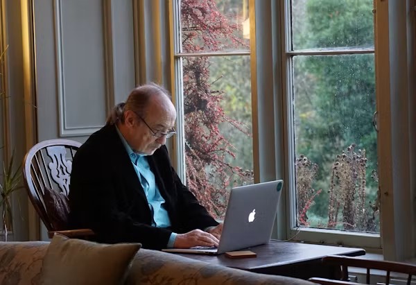 Senior comparing Medicare insurance options online in California