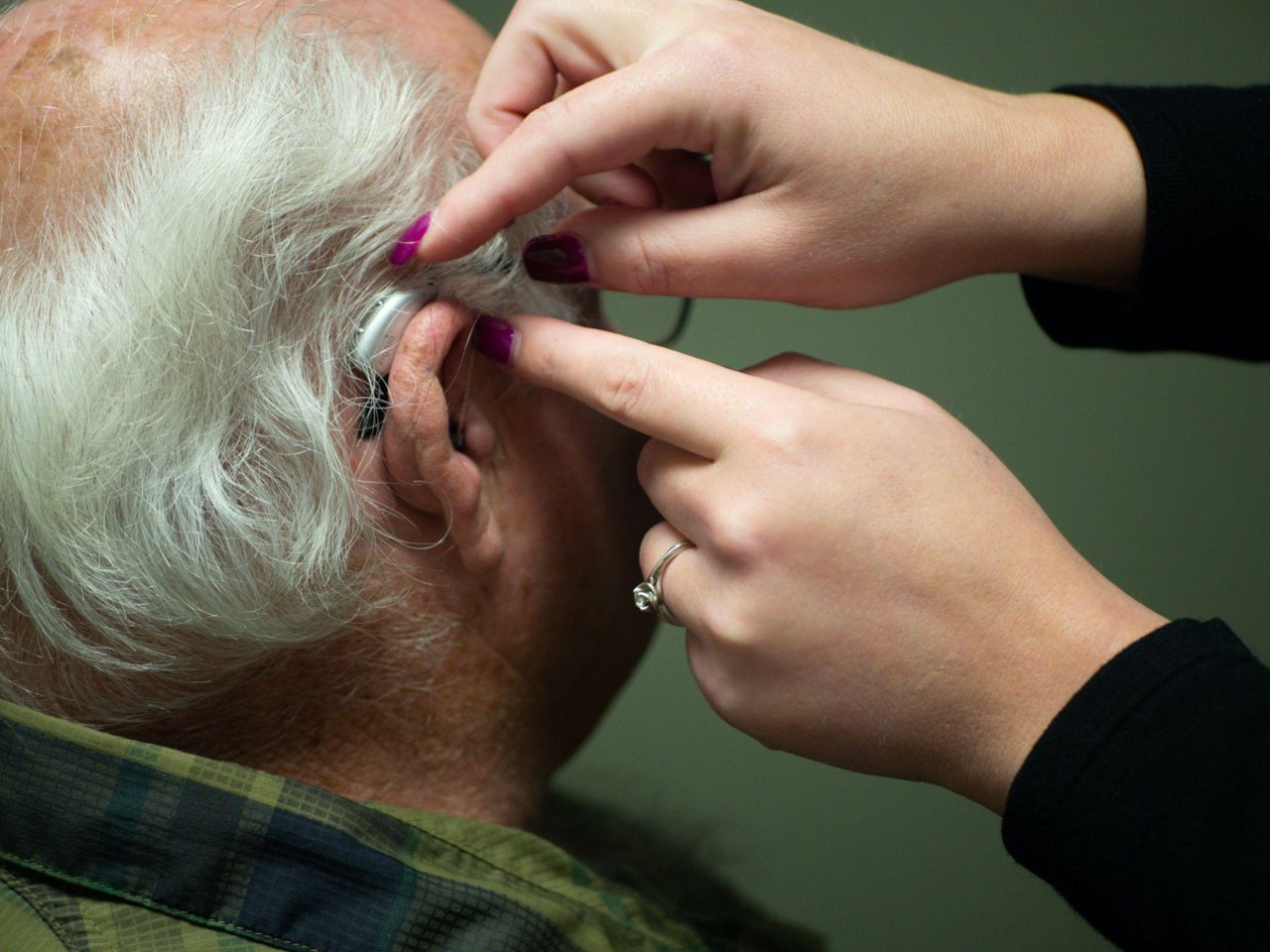 Hearing aid fitting for hearing insurance for seniors in California.