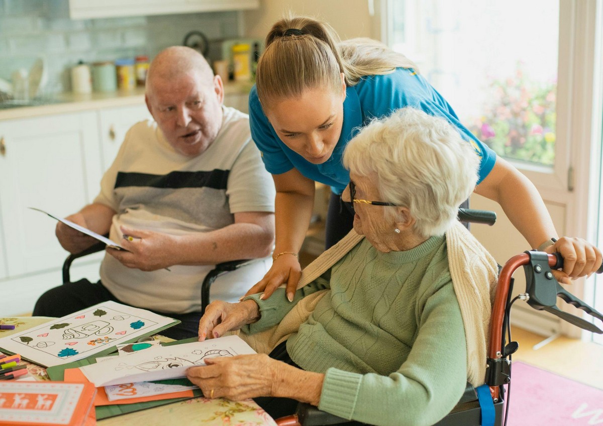 Seniors receiving care with guidance from a long term care insurance agent in California